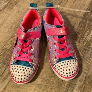 Brand new Skechers twinkle toe in purple size 1 with light up toe caps
